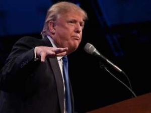 Trump embraces Muslim ban in opening TV ads